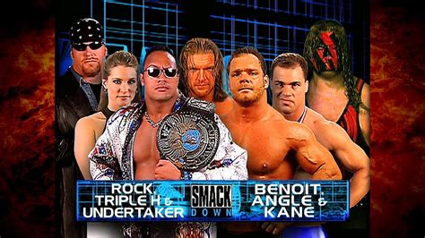 the rock vs kurt angle vs triple h wwe