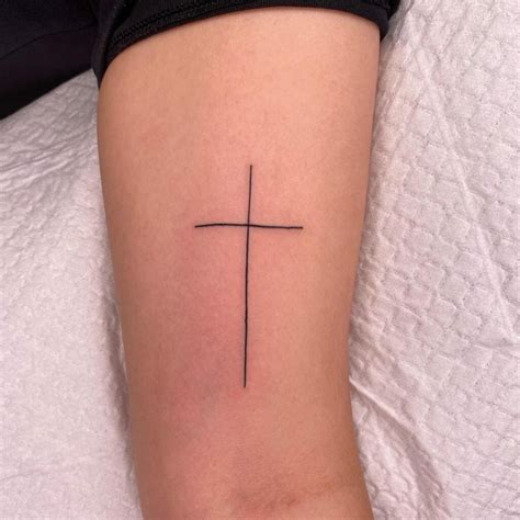 Powerful Thin Cross Tattoo Designs References