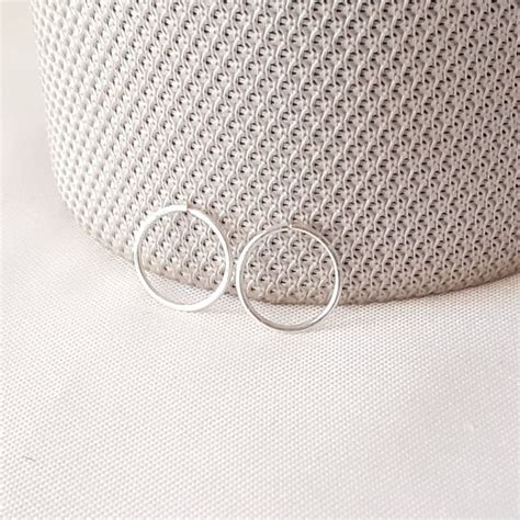 Thin Huggie Earrings Silver