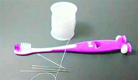 Threading A Needle Using A Toothbrush