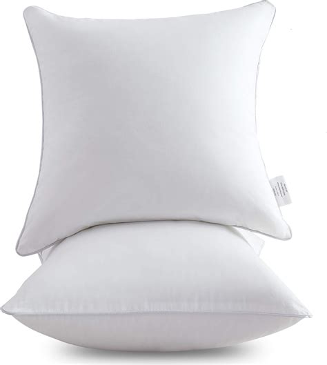 Throw Pillows On White Bedding