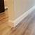 tile baseboard hardwood floor