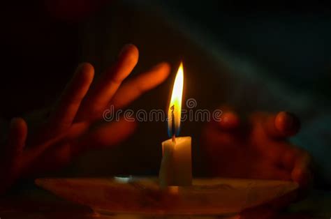 Touching Candle Flame