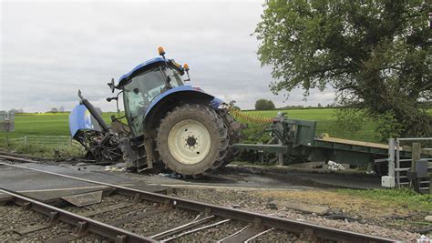 tractor hit by train