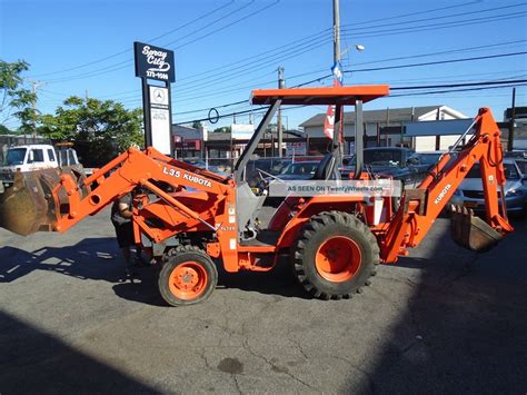 Tractor With Front End Loader And Backhoe