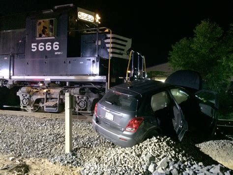 train hits a car