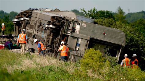 train hits dump truck missouri