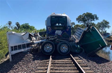 train hits semi truck today