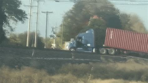 train hits truck gif