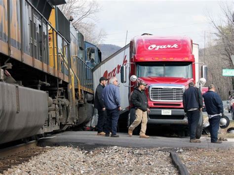 train hits truck stuck on tracks