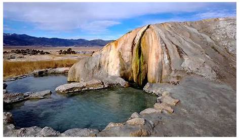 Shop "Travertine Hot Springs with snowcapped mountains in