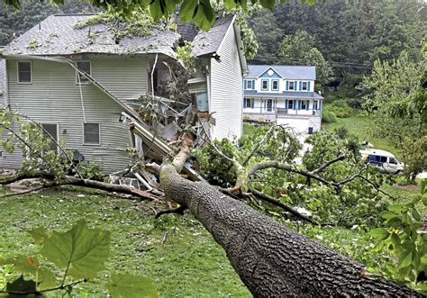 Tree falling on home