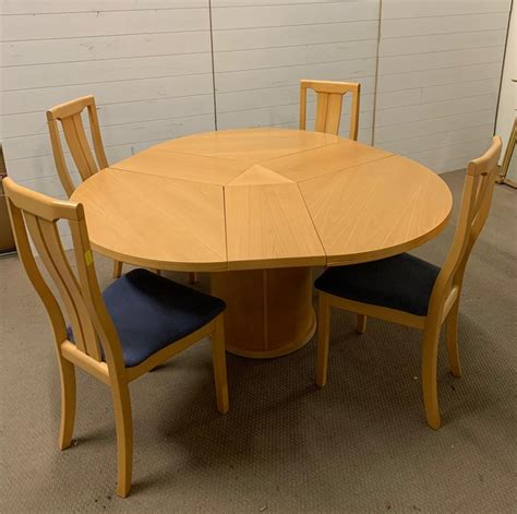 Round skovby dining table of teak casas