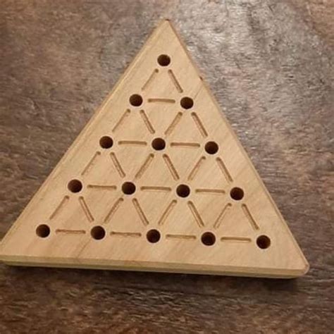 Triangle Peg Puzzle Rules