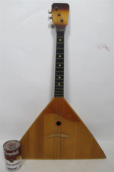 Triangular Stringed Keyboard Instruments