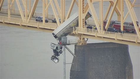 truck goes off bridge