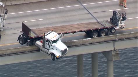 truck going off bridge