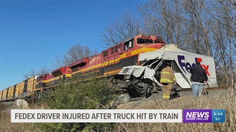 truck hit by train today