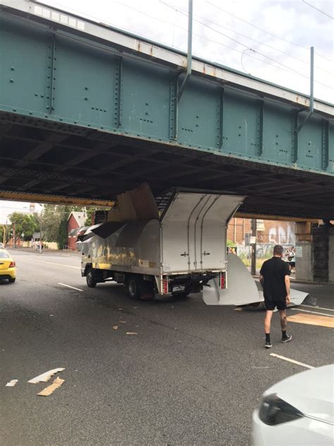 truck hits bridge melbourne today