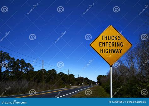 trucks entering roadway sign