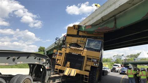 trucks going under low bridges videos