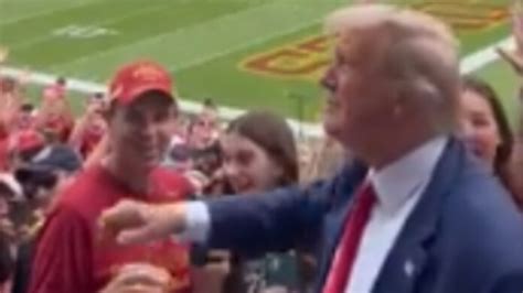 trump attends football game booed