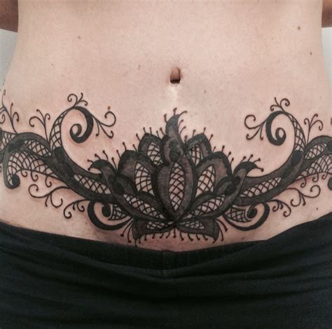 Elegant Henna-inspired Art tummy tuck tattoo ideas