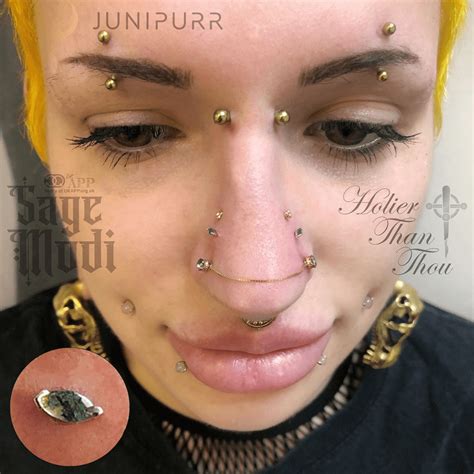 Two Eyebrow Piercings