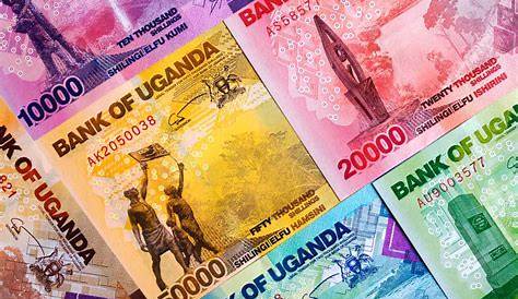 A Five Nigerian Naira Bank Note With A Thousand Ugandan