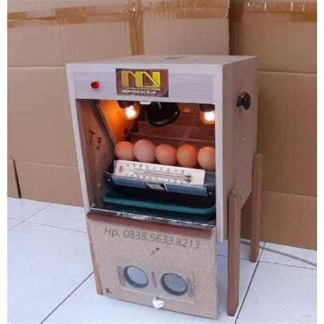 uji coba mesin penetas telur otomatis