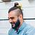 undercut hairstyle top knot
