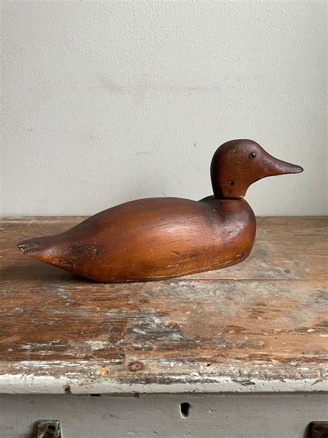 unfinished wooden duck decoys