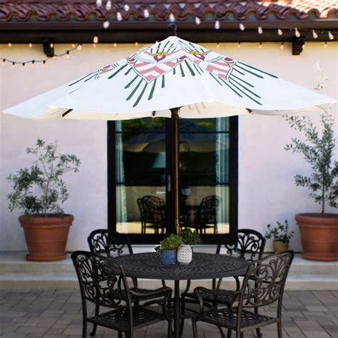 Unique hand painted patio umbrellas. Original by kimmillerdesigns