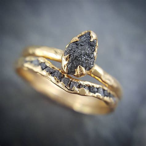 unique raw stone engagement rings