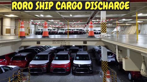 unloading cars from ships