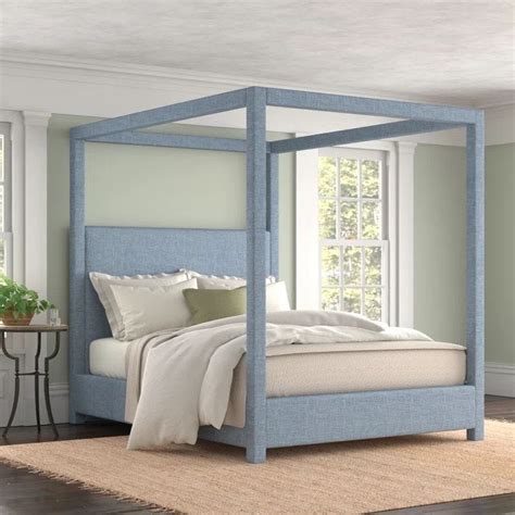 upholstered canopy bed