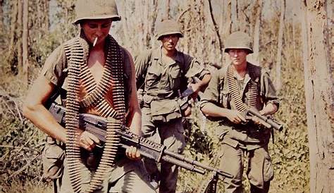Photograph of North Vietnamese Army Soldier firing SKS - Enemy Militaria