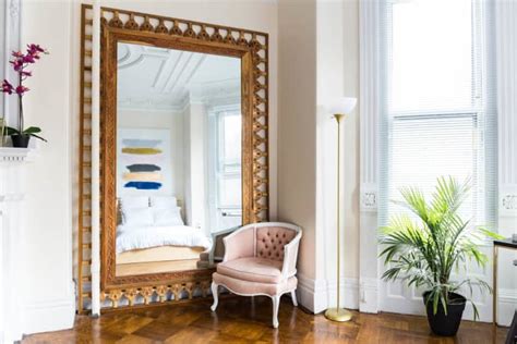 Use Mirrors to Create Illusion of Space in Bedroom Apartment