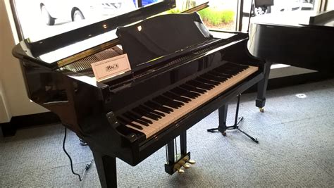 used baby grand player piano