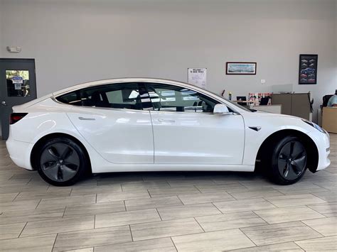 used tesla model 3 awd features