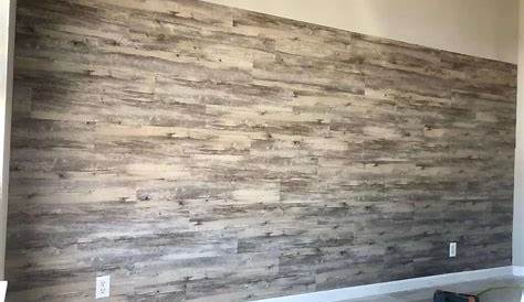a wall done in vinyl floor planks. Vinyl flooring, Home