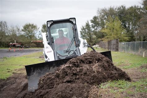 Using Dozer Blade On Skid Steer