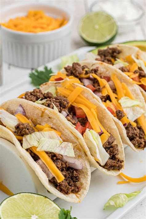 Ground Beef Tacos with Loaded Refried Bean Sauce Layers