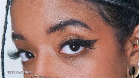 Vertical Eyebrow Piercing