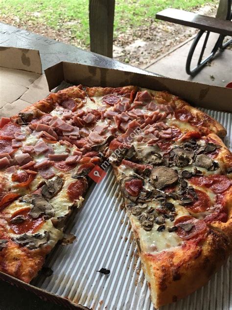 village pizza locations near me