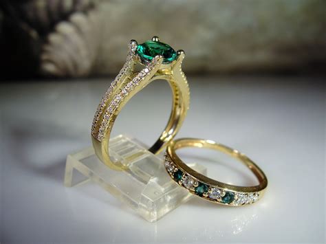 vintage emerald green engagement rings