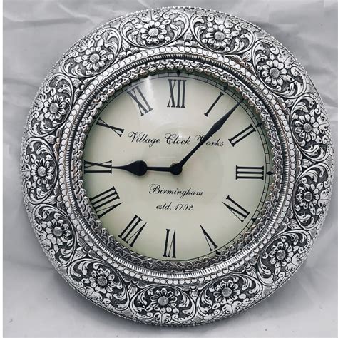 Wall Clock In Silver Design