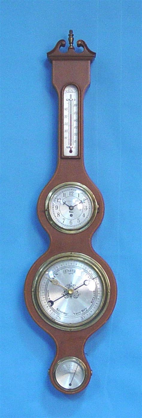 Wall Clock With Barometer And Thermometer