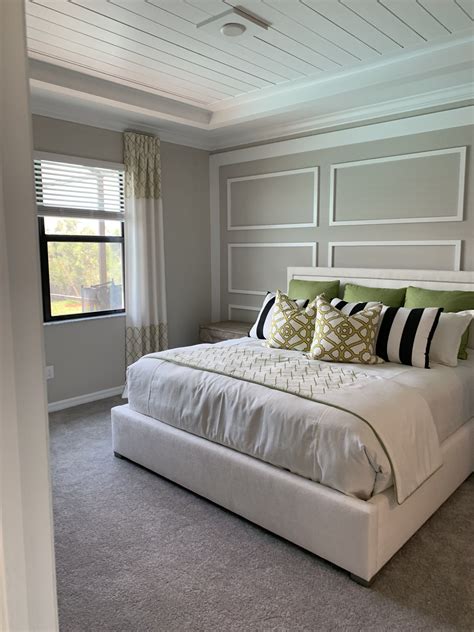 Dark gray accent wall Gray accent wall bedroom, Gray