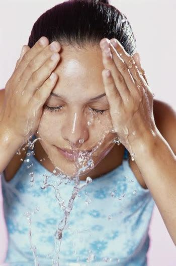 Washing Face With Warm Water